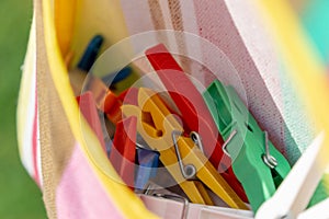 Clothespins or clothes-pegs in a bag