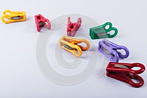 Clothespins for drying clothes. multi-colored clothespins are matte. eye-pleasing shades of color. composition