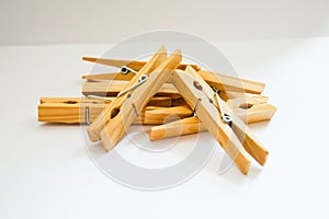 Clothespins on white background