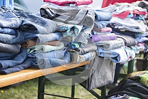 clothing collection like jeans, shirts and sweaters for the indigent or for sale at a flea market