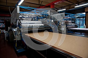 Clothing factory - Automatically cutting textile
