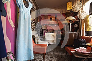 Clothing And Furniture In Second Hand Store photo