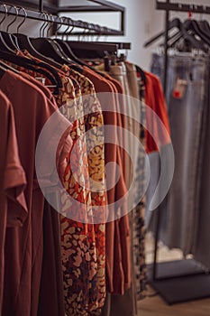 Clothing on hanger at the modern shop boutique