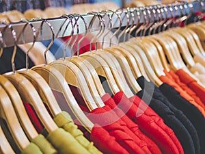 Clothing on Hangers Fashion retail Display Shop Colourful T shirt