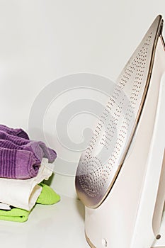 Clothing beside iron prepared for Ironing