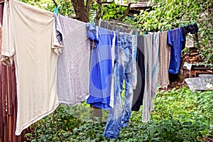 Clothing and linen dries after washing in the yard