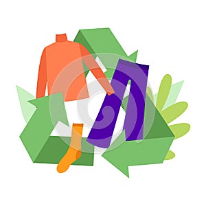 Clothing recycling concept. Large recycling sign with clothes and plants