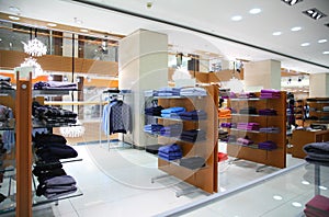 Clothing on shelfs in store