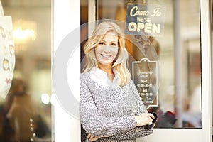 Clothing store owner woman