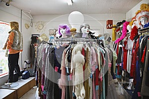 Clothing And Wigs At Second Hand Store