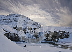 Cloud atmosphere above the Kirkjufellsfoss waterfall