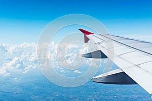 Cloud blue sky view aircraft wing airplane window