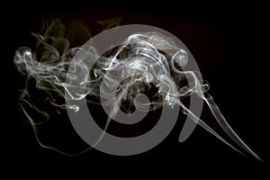 A cloud of cigarette smoke on a white background