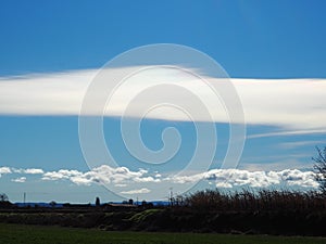 Cloud on cloud seen from ivars lake and vila sana, lerida, spain