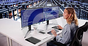 Cloud Computer Engineer Coding In Server Room In Data Center