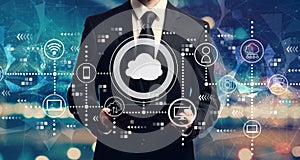 Cloud computing with businessman holding a tablet