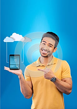 Cloud computing, happy man and phone for networking, computer system and information technology with smile in studio