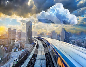 cloud computing with a speeding train on a city background