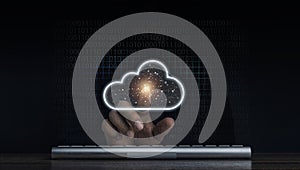 Cloud computing technology concept. Cloud icon virtual appeared while man pointing finger and keyboard computer with network.