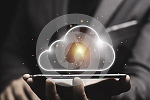 Cloud computing technology transformation concept, Businessman touching on Virtual cloud computing on tablet for transfer upload