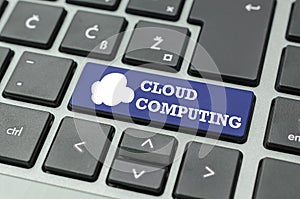 Cloud computing text and icon on a computer key