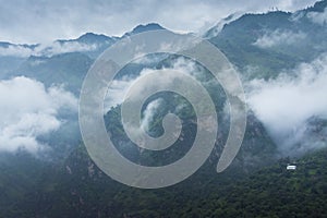 Cloud covered mountains on a summer morning near Shimla,Himachal Pradesh,India