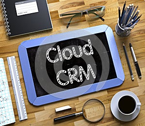 Cloud CRM Handwritten on Small Chalkboard. 3D.