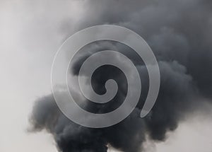 Cloud of dark black smoke