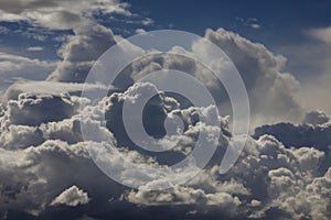 High dramatic clouds in a blue sky