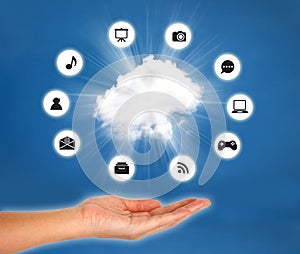 Cloud on hand against blue sky