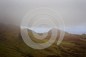 Cloud Hanging Over Mountain Range in Scotland