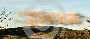 Cloud hangs above the summit of Brocken in the german Harz