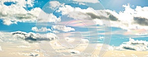 Cloud iridescence in blue sky, effect of sunlight