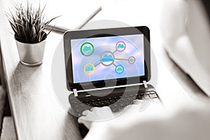Cloud networking concept on a laptop screen