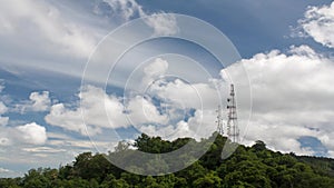 Cloud over antenna of cellular cell phone and communication system tower