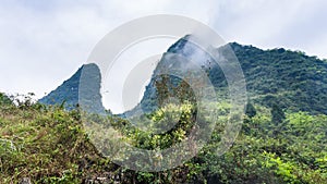 cloud over mountain peaks in Yangshuo