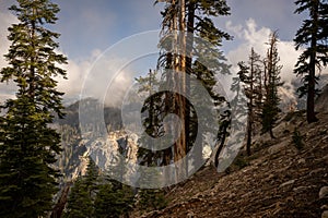 Cloud Puffs Waft through the Canyon along the Watchtower Trail