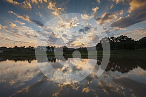 Cloud reflection at lake  during sunrise.