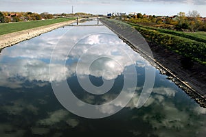 Cloud reflection in water canal