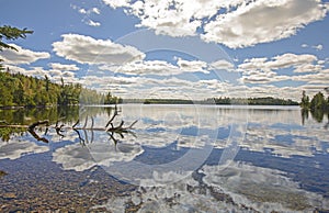Cloud Reflections on a Calm Lake on a Sunny Fall Day