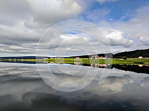 Cloud reflections on Lac des ThaillÃ¨re, Switzerland