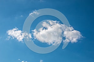 A cloud in shape of a fish in the blue sky