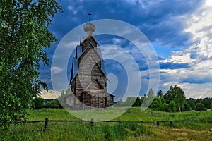 Cloud sky over the wooden church at Shirkov Pogost