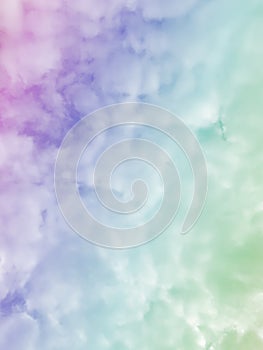 Cloud and sky with a pastel rainbow colored background.