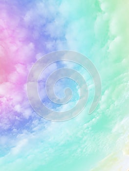 Cloud and sky with a patel rainbow colored background photo