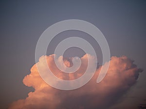 Cloud in a sky in a shape of a snail. Nature abstract background