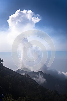 Cloud of smoke emanating from the summit of the Santiaguito photo