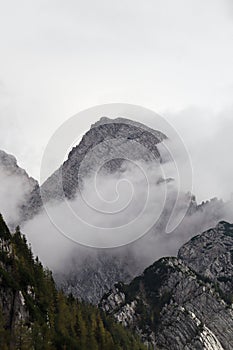 Cloud Surrounds The Top Of The Mountain