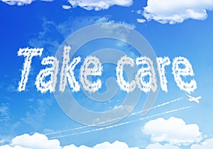 Cloud text : TAKE CARE on the sky.