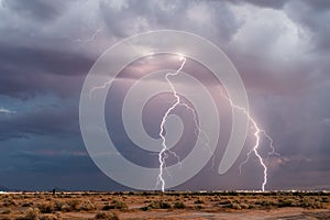 Cloud to ground lightning bolt strikes from a storm in Arizona